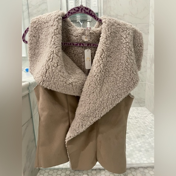 Shearling and Suede vest. Large never worn. - Picture 1 of 2